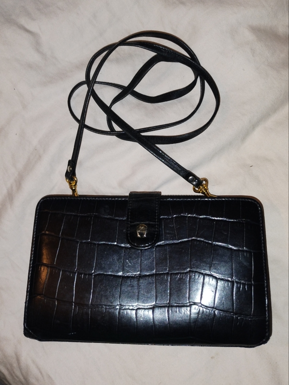 Etienne Aigner black croc-embossed leather clutch purse with a shoulder strap